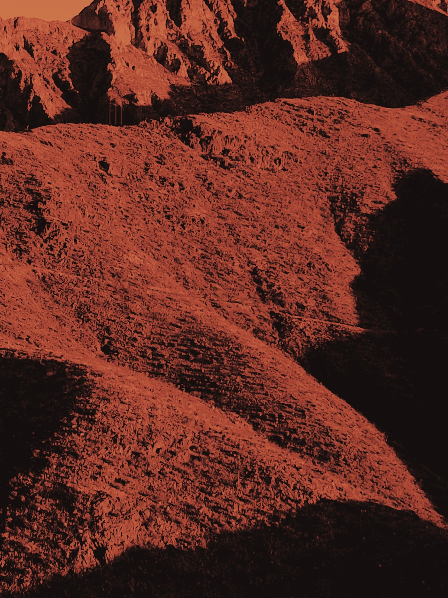 Red mountain in low sun